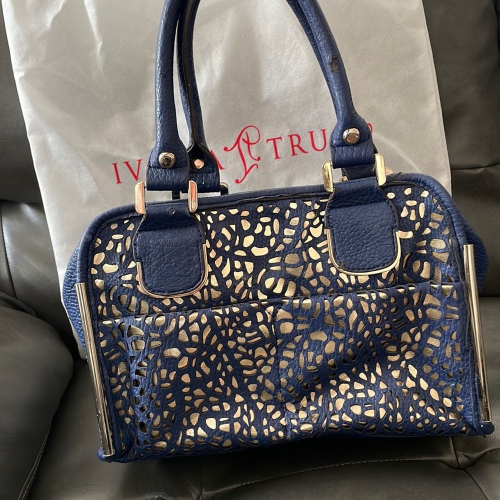 Ivanka Trump purse blue with gold accents